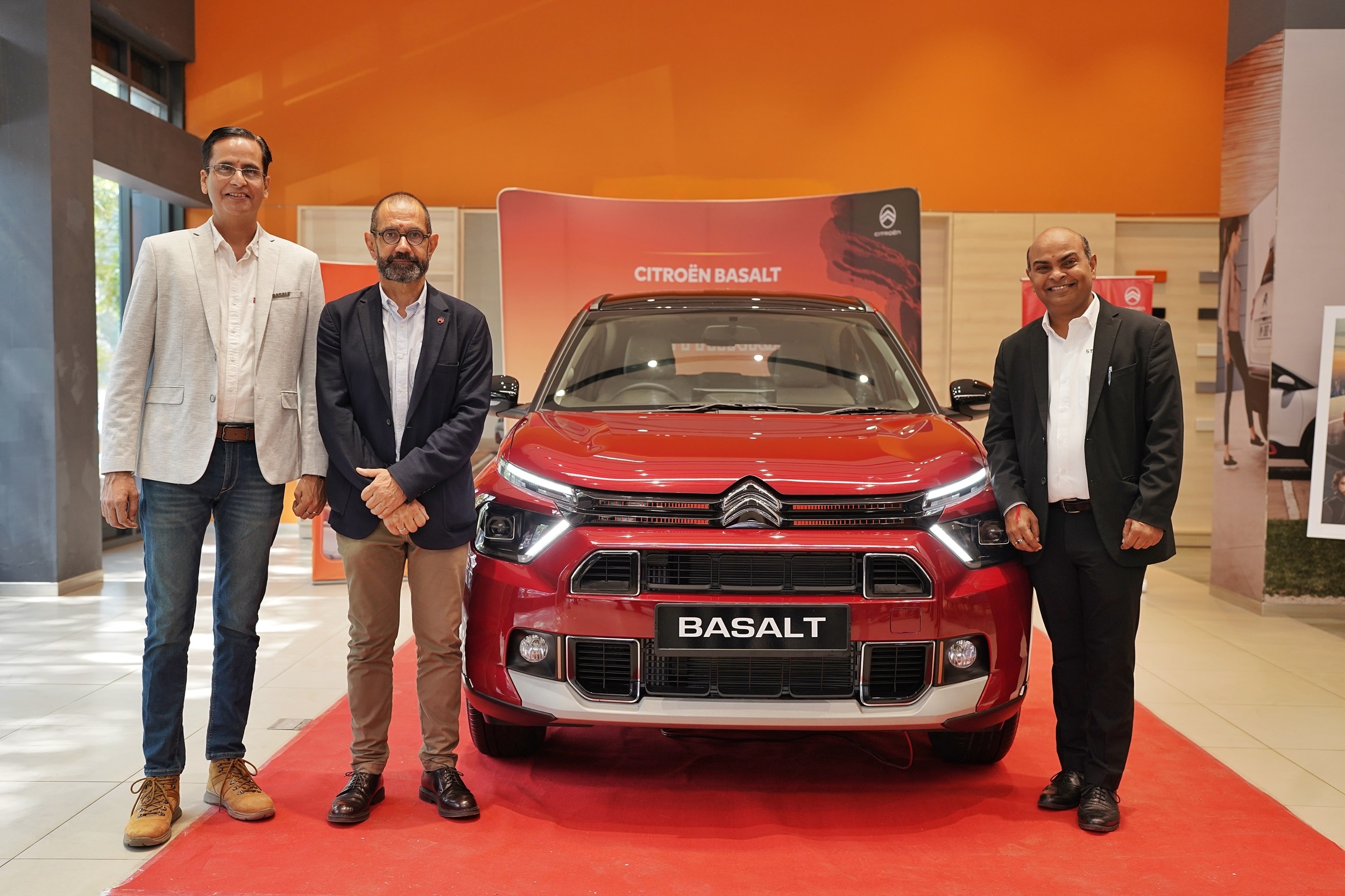 (L-R) Shishir Mishra, Citroen Brand Director with Theirry Koskas, Brand CEO & Shailesh Hazela, MD & CEO - Stellantis India with the Basalt 