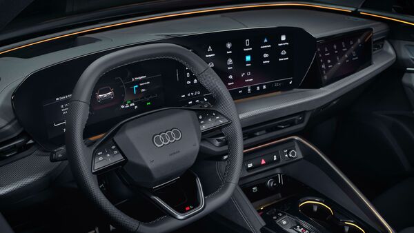 The dashboard of the Q5 is entirely covered with a two-part display which houses the instrument cluster and infotainment alongside a separate 10.9-inch passenger display. A long, curved display houses the 11.9-inch cluster and the 14.5-inch MMI infotainment screen that contains HVAC controls. 