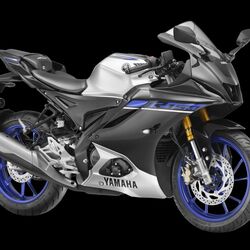 The R15M, launched by Yamaha Motor India, features a carbon fibre trim variant. Metallic Grey is priced at ₹1,98,300, while the carbon option costs ₹2,08,300. The bike maintains its 155 cc engine with 18.10 bhp and 14.2 Nm torque.