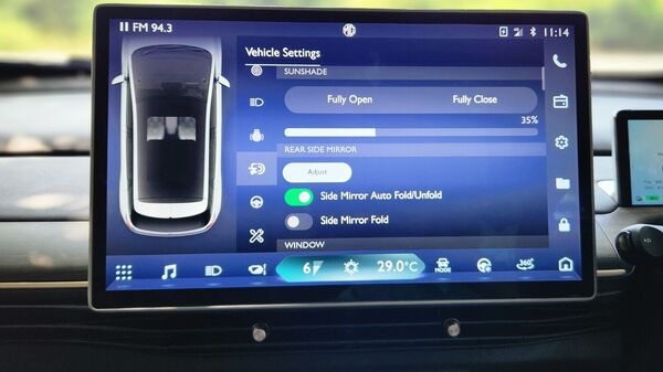 Plonking every car-related function on the main display unit inside the Windsor EV may be a futuristic take on convenience but is not very conducive to regular use. The display itself, however, is bright and crisp, especially when engaging the feed from the 360-degree cameras. Plonking every car-related function on the main display unit inside the Windsor EV may be a futuristic take on convenience but is not very conducive to regular use. The display itself, however, is bright and crisp, especially when engaging the feed from the 360-degree cameras.