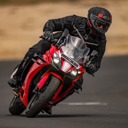 The 2024 TVS Apache RR 310 lineup starts from  ₹2.75 lakh for the Racing Red paint scheme without the quickshifter. However, adding the quickshifter takes the price to  ₹2.92 lakh. The new Bomber Grey paint scheme is priced at  ₹2.97 lakh.