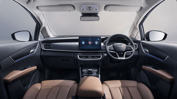 The new dash of the car holds in place a 12.8-inch infotainment screen with the BYD's signature rotation feature, Additionally, the eMAX 7 gets redesigned centre console controls and a new three-spoke steering wheel.