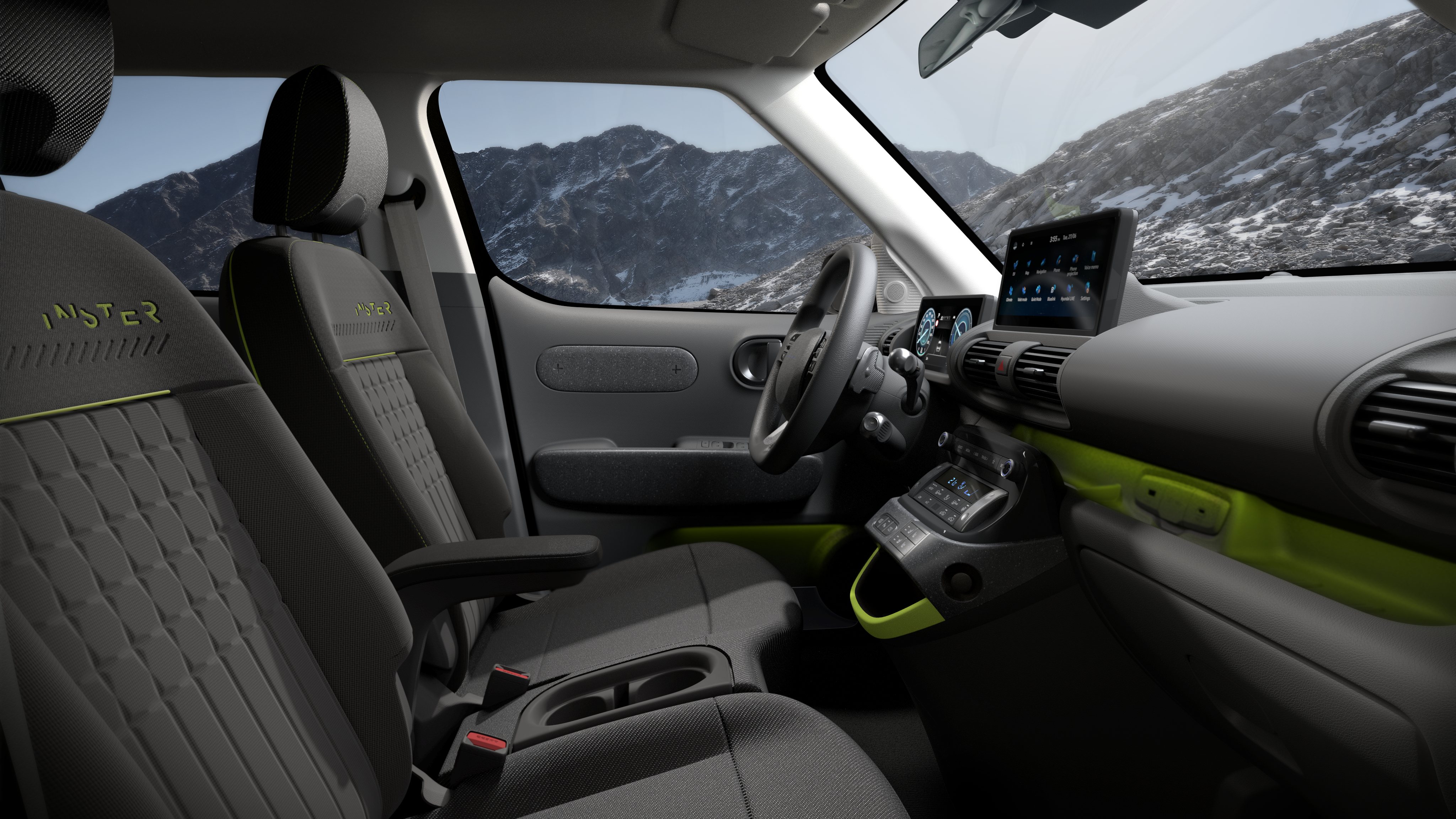 The Hyundai Inster Cross retains the same interior layout as the standard Inster but gets grey fabric upholstery and lime-yellow accents 