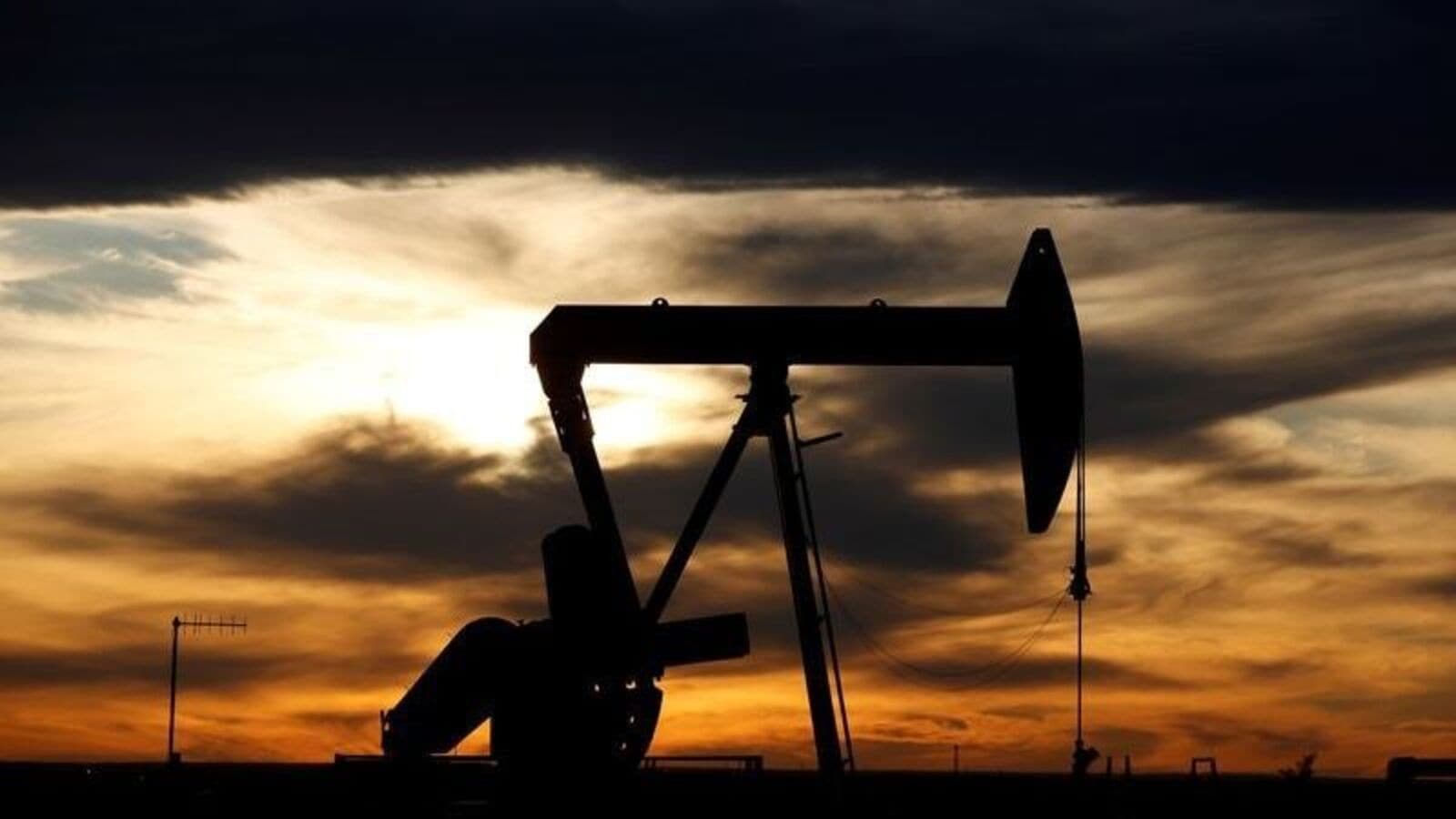 Crude oil prices hold at a two-week low level on lower demand growth forecasts