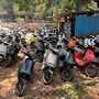 Ola Electric scooters are seen outside the Ola Electric Service Centre in Thane, on the outskirts of Mumbai. The EV maker has roped in global consulting firm Ernst & Young to overhaul its after-sales service as it faces probe over poor servicing. (REUTERS)