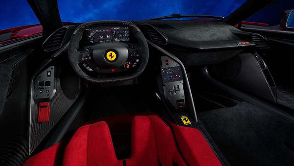 The steering of the Ferrari F80 is flat at the top and bottom, making it feel like you're in a Formula 1 car. This steering will soon also be made available for other Ferrari models. The car gets three driving modes including Hybrid, Performance and Qualify, but misses out on an electric-only mode.