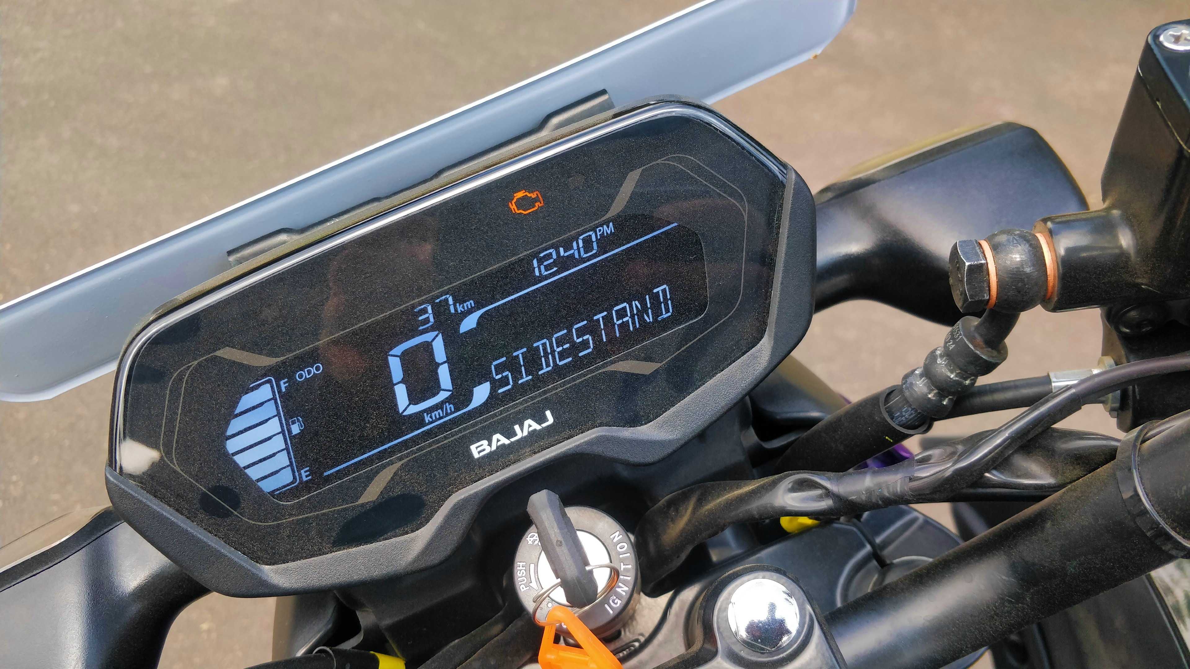 The 2024 Bajaj Pulsar N125 top variant gets a full digital instrument console with Bluetooth connectivity, while the lower trim gets a semi-digital unit 