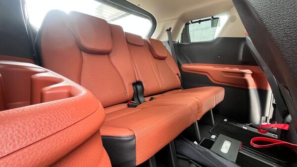 Kia Carnival has one of the most spacious third-row seats for any vehicle in the Indian car market. Obviously not as comfortable as the dedicated two seats in the middle, sitting here would, however, not feel like a compromise either. Three-zone climate control allows customised cooling while there are dedicated charging ports, lights and cupholders all around.