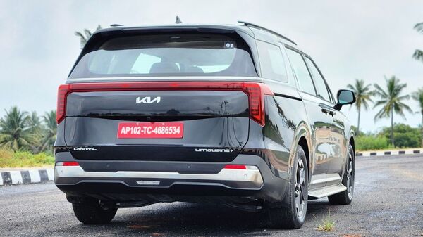 The rear profile of the latest Kia Carnival is comparatively simple with the connected LED light the flashiest bit here.