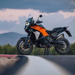 KTM has unveiled its new flagship 1390 Super Adventure S Evo globally. The adventure motorbike comes with updated hardware and design and features for the year 2025.