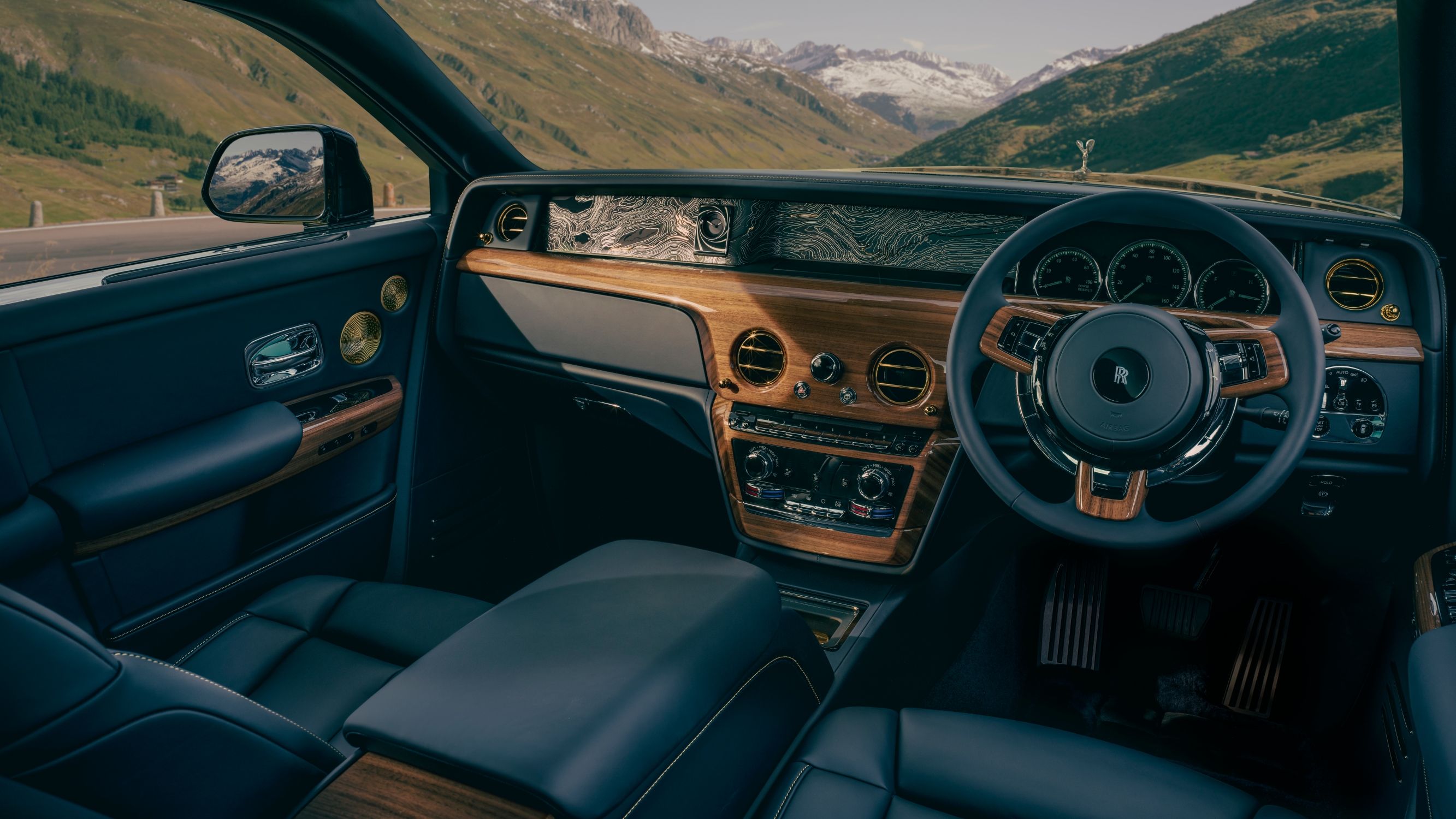 The interior features wooden inserts and real gold inlays and a hidden compartment in the centre console contains a solid gold bar in the shape of a Phantom Speedform.