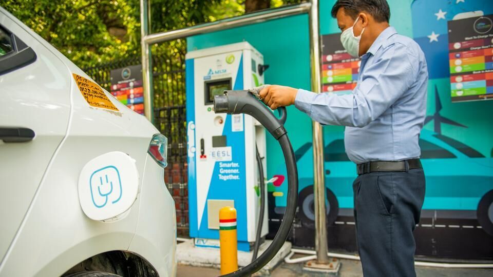 Man charging EV