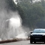 An anti-smog gun being used to spray water droplets to curb air pollution in New Delhi. (Arvind Yadav/ Hindustan Times)