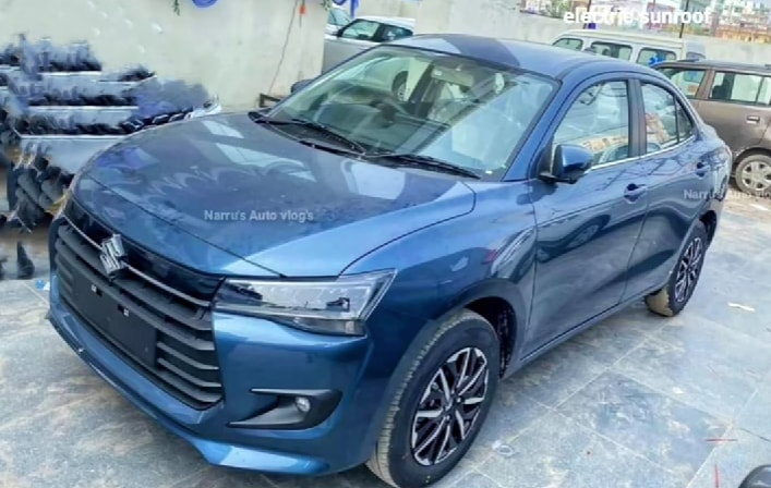 The front fascia of the 2024 Dzire sports a newer, sleeker and more rectangular LED headlamps, an updated bumper and an all-new seven-slat grille with a chrome strip. 