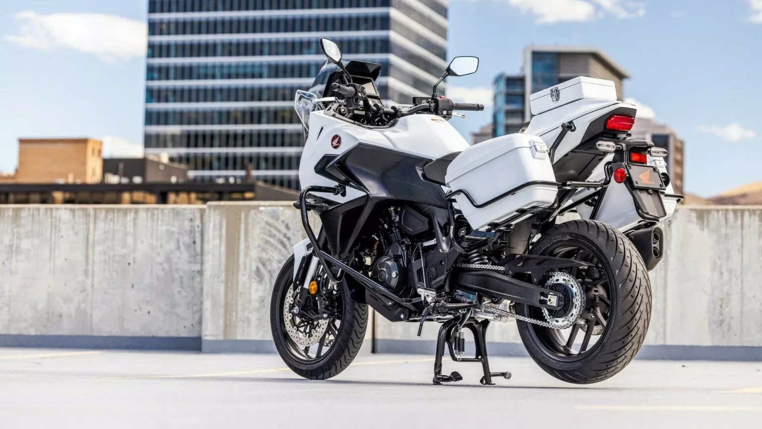 The Honda NT1100 Police gets additional equipment including new protective fairings, an adjustable windshield, a more comfortable seat, all-LED lighting, pannier bags, an engine guard, a document box, and a seat cowl