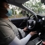 File photo: A safety driver monitors a Lexus vehicle equipped with Pony.ai's autonomous driving system as the car drives on a road during a test event, in Beijing, (REUTERS)