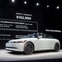 Representative Director Chairperson and CEO of Sony Honda Mobility Yasuhide Mizuno presents the Afeela 1, a new electric vehicle, at the Consumer Electronics Show (CES) in Las Vegas on January 6. Booking for the EV has been opened in California for now with launch in Japan scheduled for 2026. (AFP)