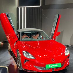 The MG Cyberster offers a single-charge range of 507 km with a 77 kWh battery pack. 