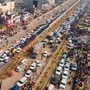 Hundreds of vehicles carrying pilgrims to Maha Kumbh 2025 are seen stuck i a long traffic jam outside Prayagraj. More than one crore devotees are expected to take holy dip at the Sangam on Wednesday, February 26.