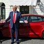 Tesla CEO Elon Musk has reiterated his commitment of doubling the production of the company's electric vehicles, but this time attributed this target to the support of US President Donald Trump. (AP)