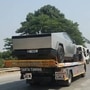The Cybertruck was seen being transported on the back of a semi-trailer. (Tesla Club India/X)
