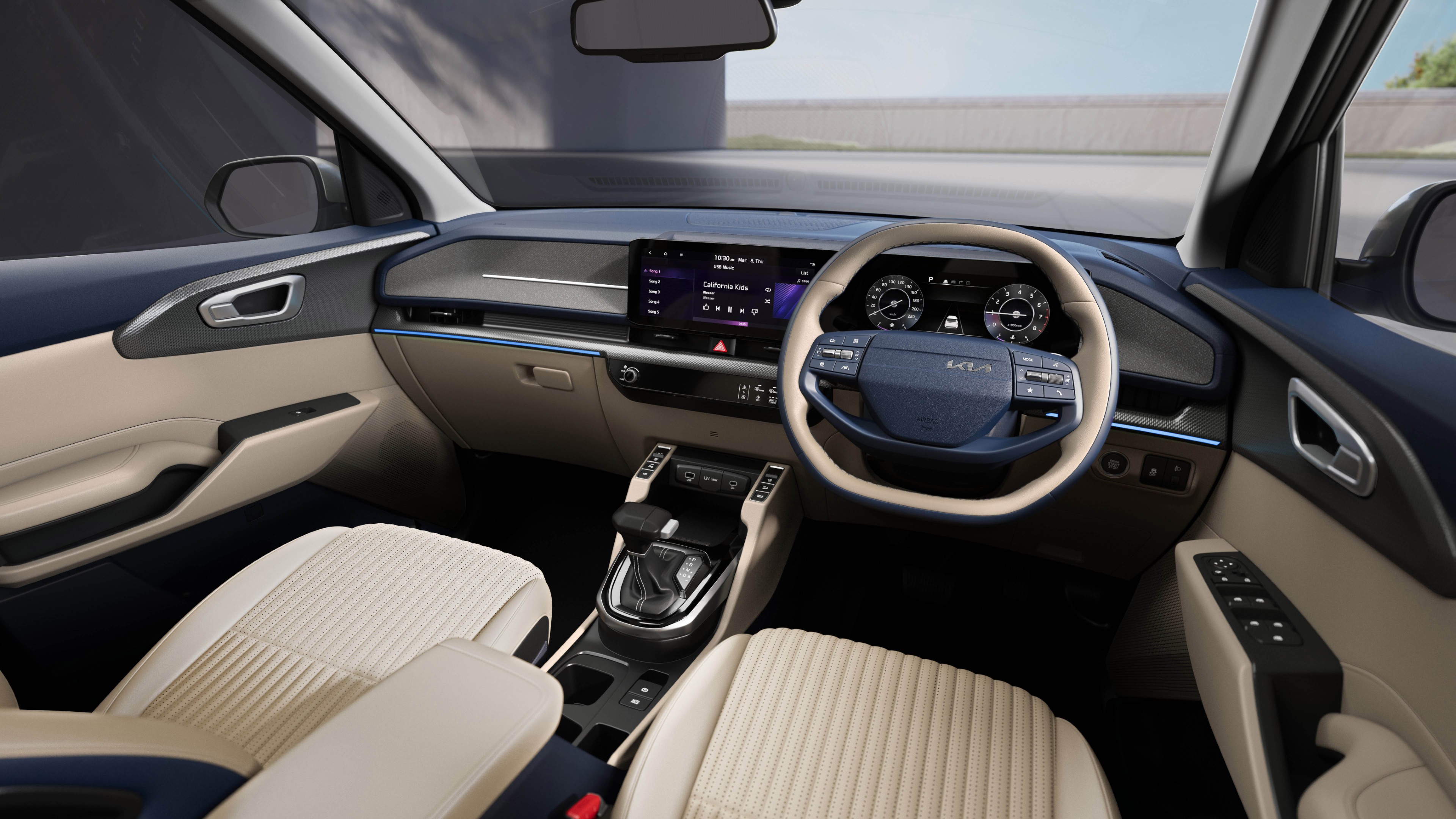 The Carens Clavis gets a new dashboard layout with the panoramic display for the cluster and infotainment screen. It also gets the new two-spoke steering with the offset Kia logo Kia Carens Clavis Cabin