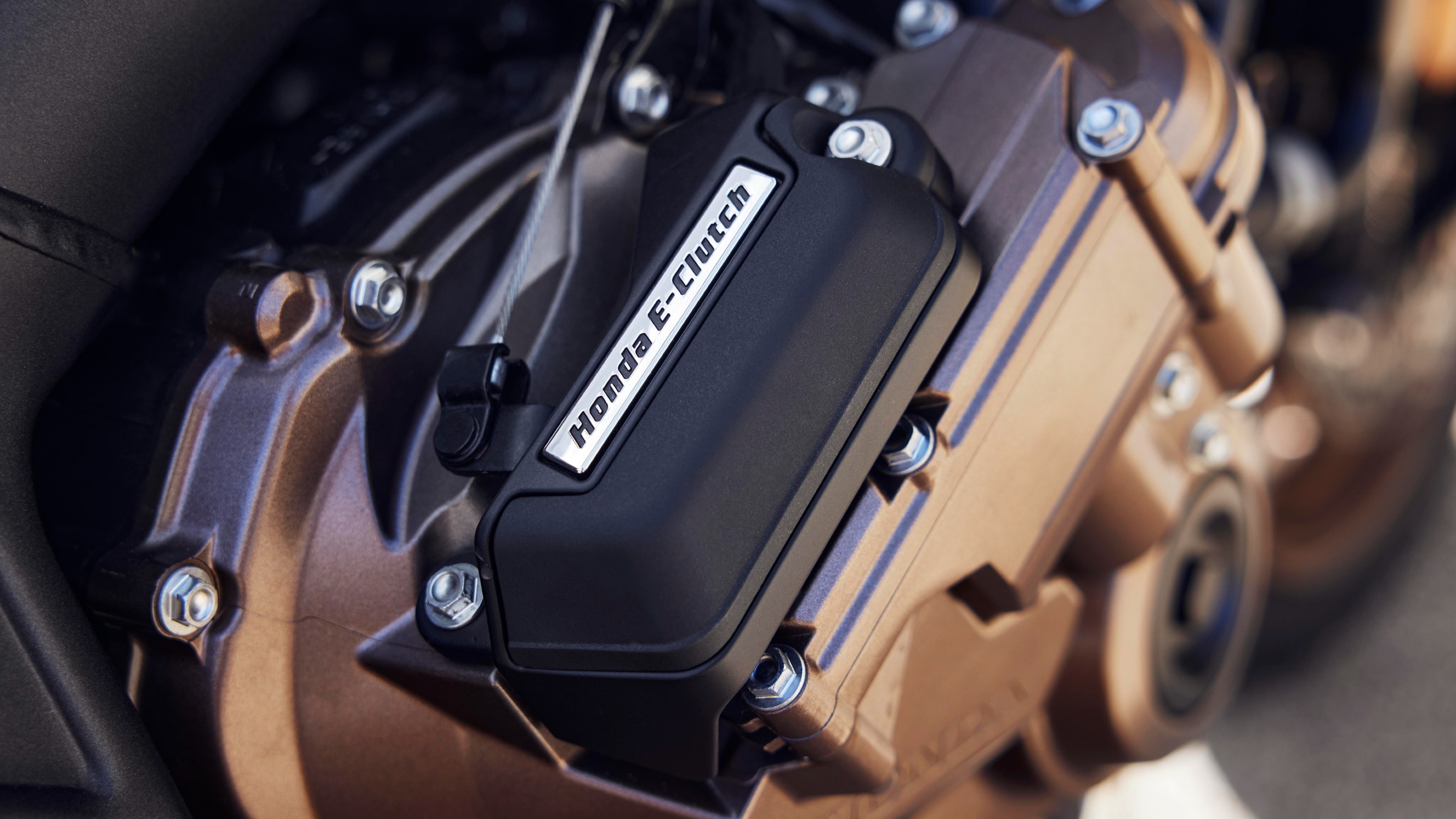 The Honda E-Clutch allows shifting gears without having to use the clutch lever and will operate accordingly to ignore stalling the vehicle Honda E-Clutch