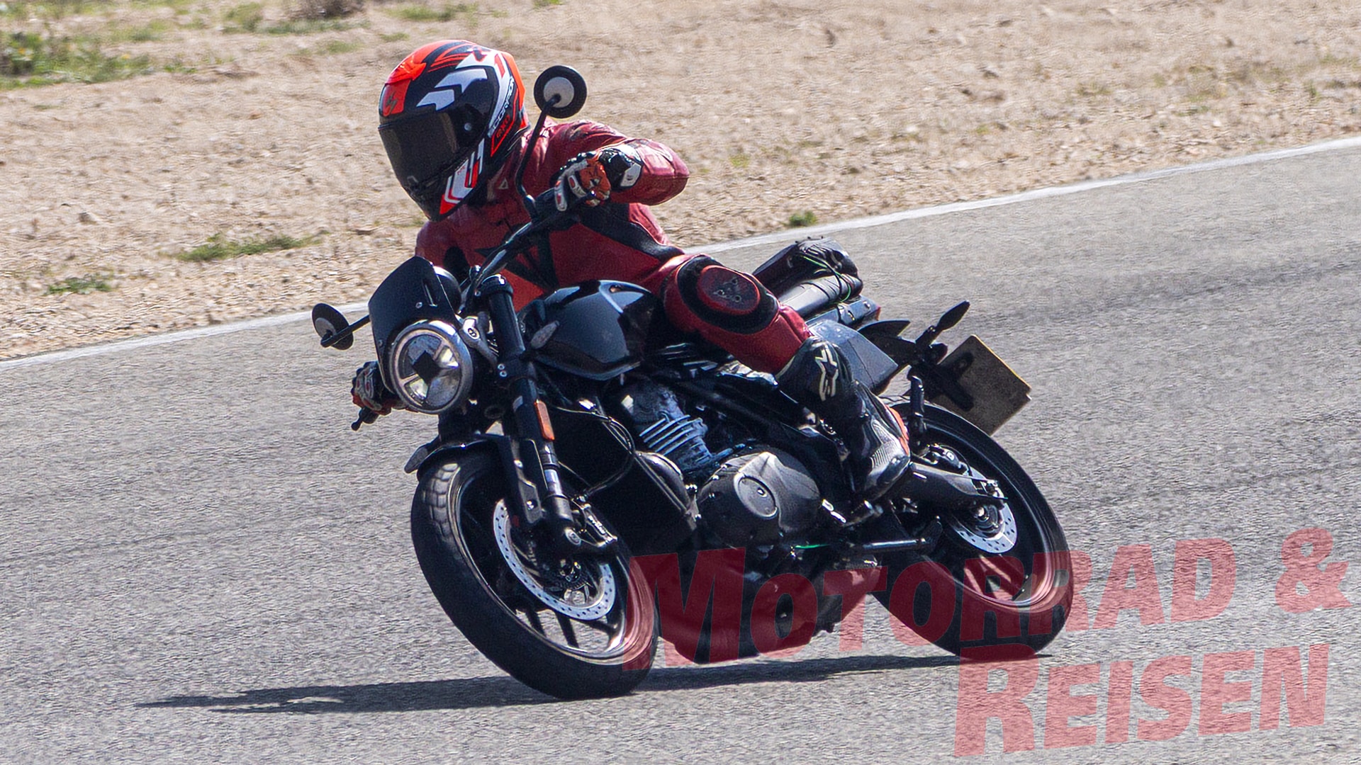 The rear of the bike gets a reworked, minimalist tail section, an exposed basic pillion grabrail, and reduced tail lights Triumph Scrambler 400 X