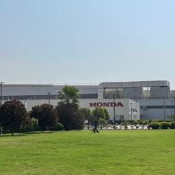 The company aims to launch new electric models annually and establish a dedicated EV manufacturing facility in Karnataka by 2028, while acknowledging the continued demand for internal combustion engine bikes.