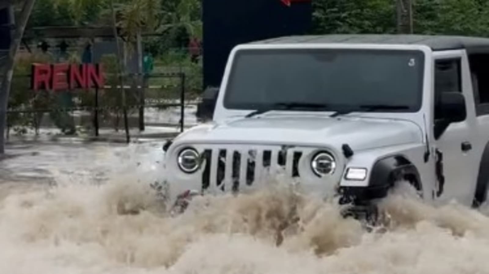 Watch: Stock Mahindra Thar wades through flooded streets in a viral video Watch: Stock Mahindra Thar wades through flooded streets in a viral video