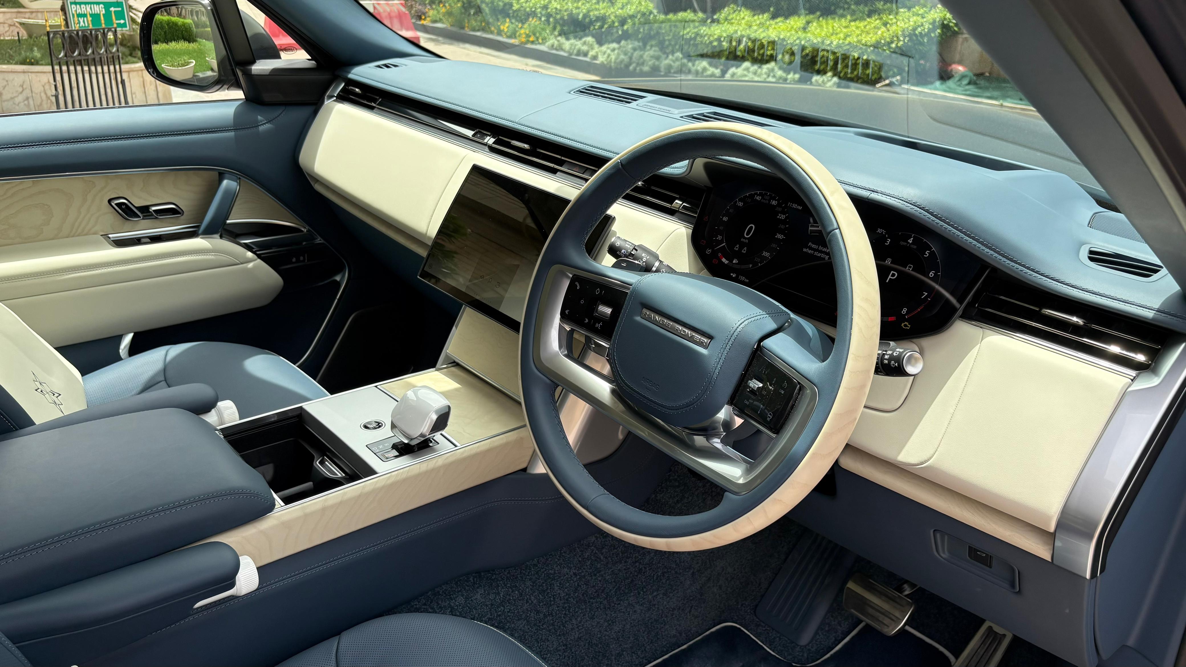 The cabin gets the blue and cream colour scheme with ash veneer and ceramic white finish all across, including specially embroidered seats inspired by the blue sapphire Range Rover SV Masara Edition