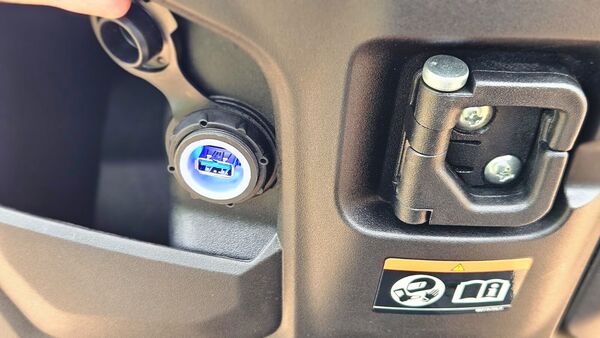 The e-Access comes with an underseat storage that should take the charger that comes with the bag. There is a USB port along with a cubby space and a multi-function starter knob that can open the seat, turn on the scooter and open the charging flap as well. The e-Access comes with an underseat storage that should take the charger that comes with the bag. There is a USB port along with a cubby space and a multi-function starter knob that can open the seat, turn on the scooter and open the charging flap as well.