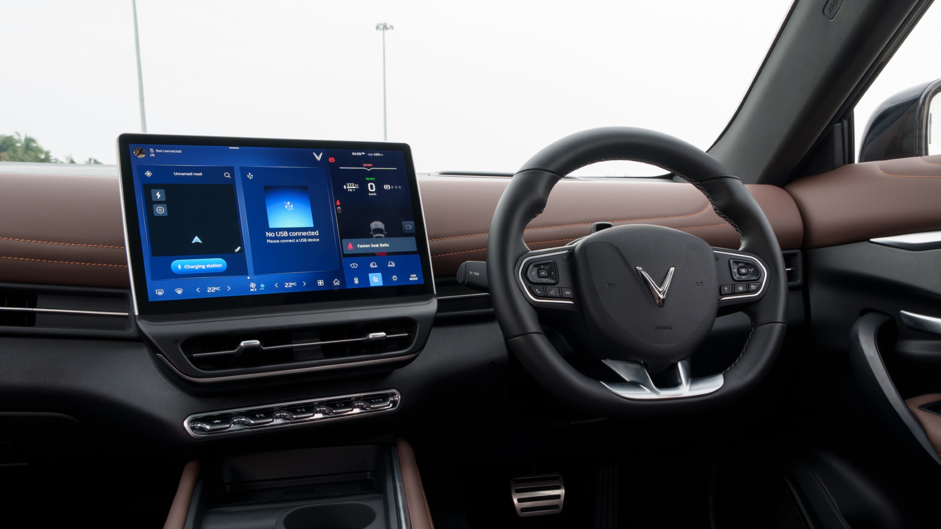 The toggle switches essentially are individual drive selectors. You also get three driving modes - Eco, Normal and Sport, as well as regen modes to enhance battery life VinFast VF7 Review