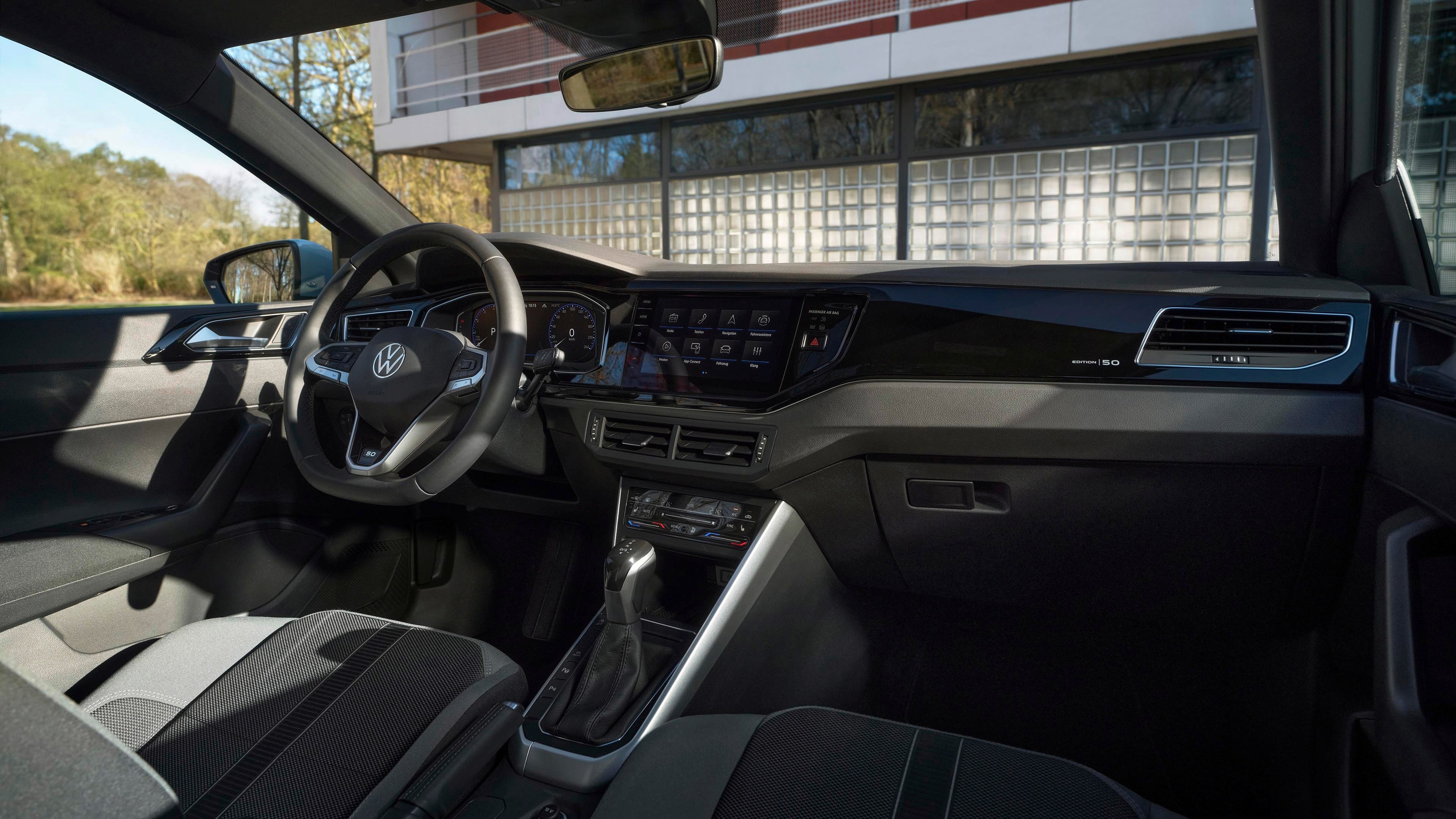 The cabin sports the '50' lettering on the steering wheel, while there's ambient lighting, a panoramic sunroof, chrome pedals, heated front seats, and more Volkswagen Polo Edition 50
