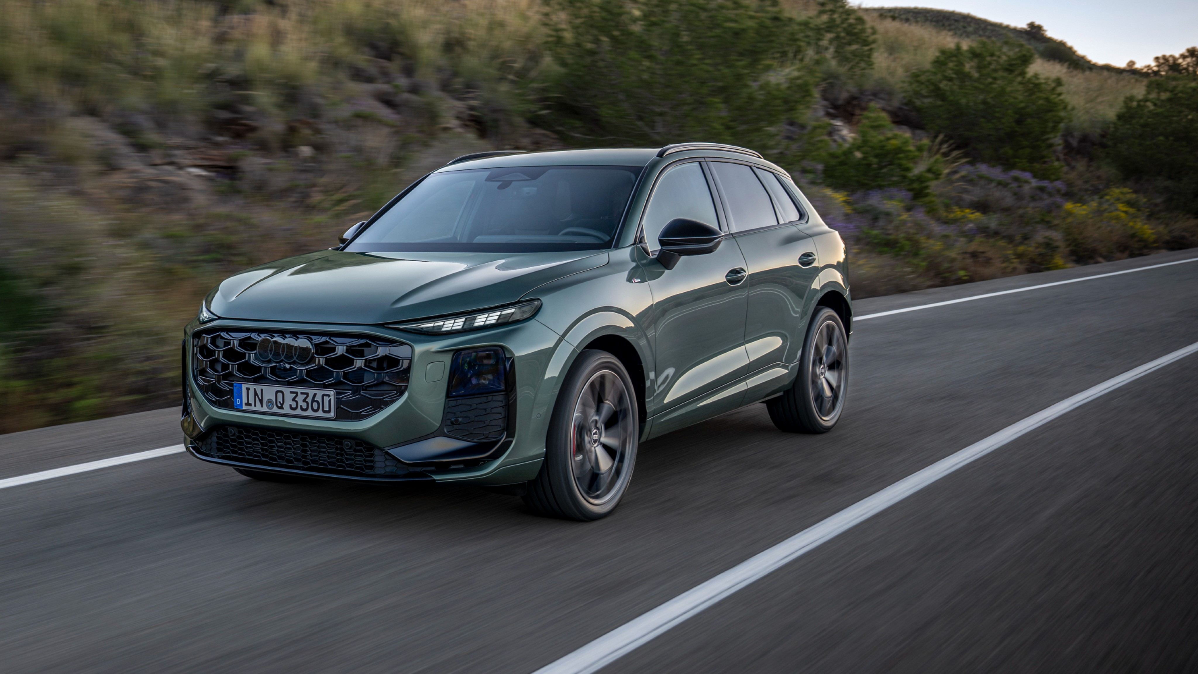 The new Q3 gets the massive single-frame grille and split headlamps with the pixels-shaped LED DRLs, and Matrix LED headlamps 2026 Audi Q3
