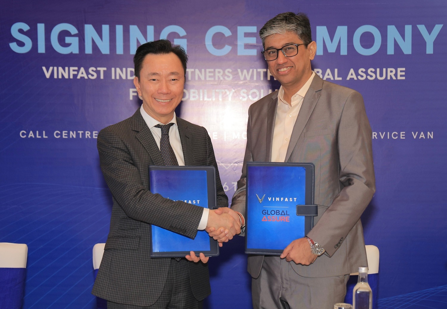 (LR) Pham Sanh Chau, CEO - Vinfast Asia with Manish VIJ, Co -Founder & CEO, Global Assure, Which will provide customer support to Vinfast Vinfast Vinfast Vinfast Vinfast Vinfast Ownes in INDIA Vinfast global assure