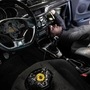 A mechanic removes from a Citroen car an airbag module made by the Japanese airbag manufacturer Takata, in a garage in Mulhouse, eastern France.  (AFP)