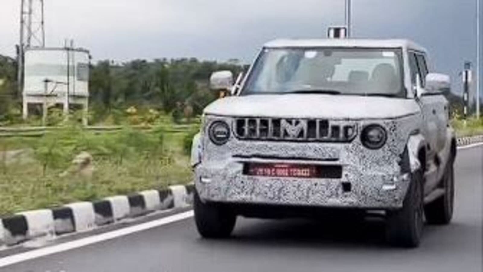 Mahindra Bolero Neo revealed with LED headlamps and boxy design during testing Mahindra Bolero Neo revealed with LED headlamps and boxy design during testing