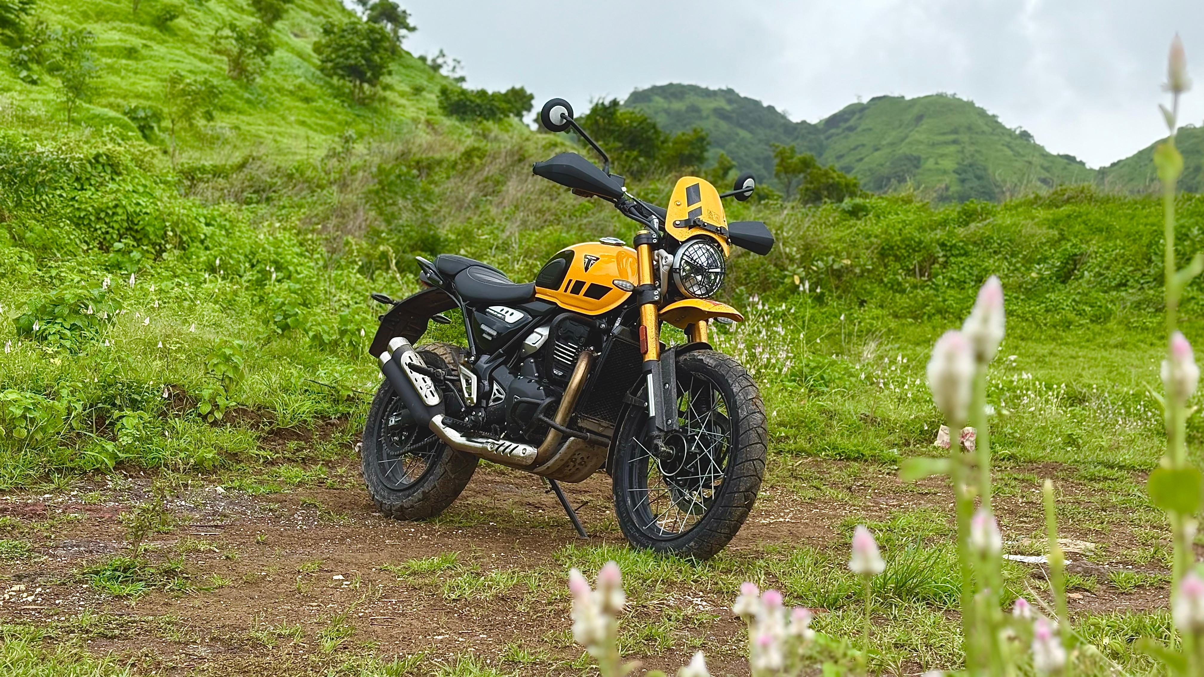 The 2025 Triumph Scrambler 400 XC looks smashing in the new yellow paint scheme, while the new fly screen and raised mudguard give it a more authentic off-road appearance 2025 Triumph Scrambler 400 XC Review