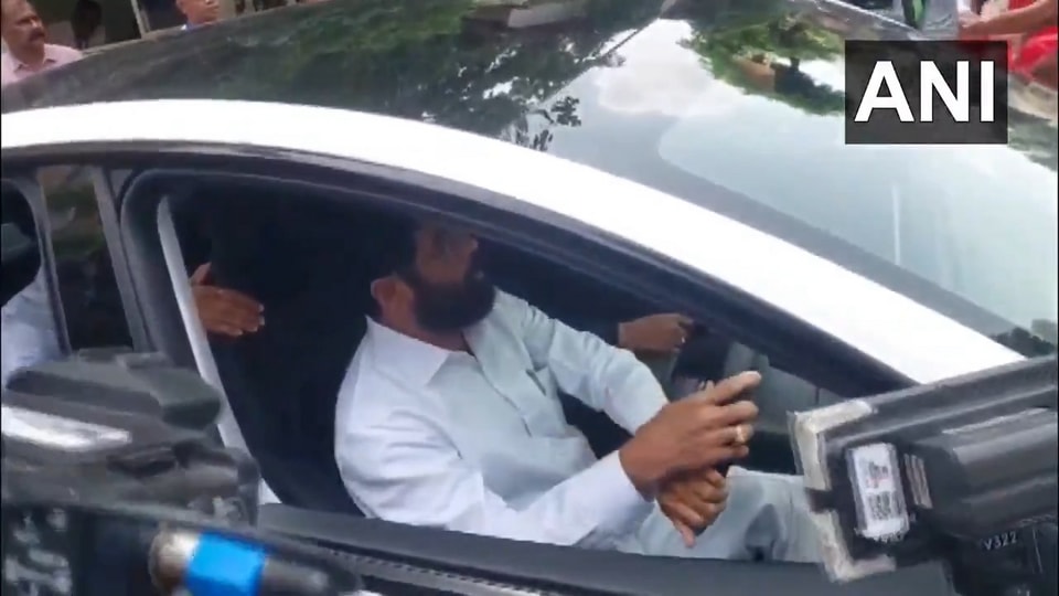 Eknath Shinde drives Tesla