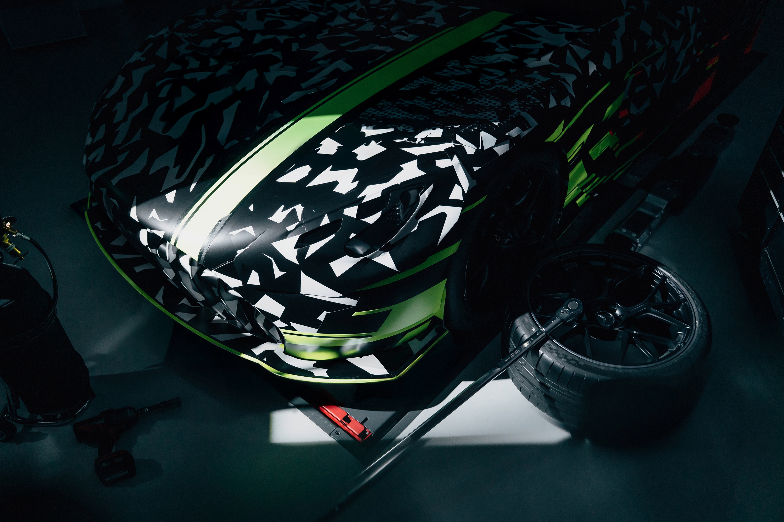 While design cues are reminiscent of GT3-spec racing cars, tyres visible in the teaser indicate that this is perhaps not a stripped-out racing car but one that might be road-legal. Mercedes-AMG GT Track Sport
