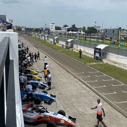 Formula 4 racecars lining up on the pit ahead of quali on Day 1
