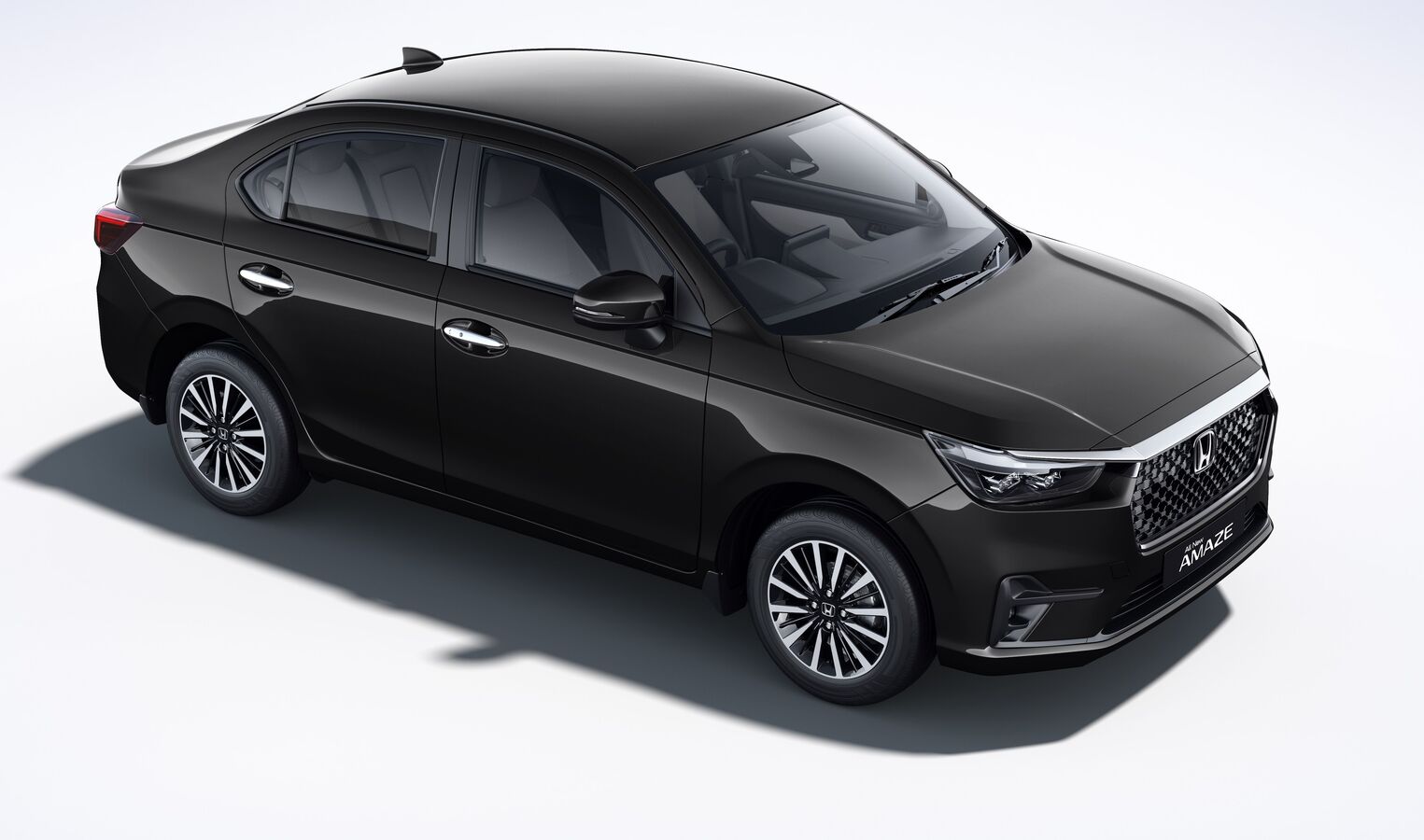 <div>Honda Amaze gets new 'Crystal Black Pearl' colour option in India</div>