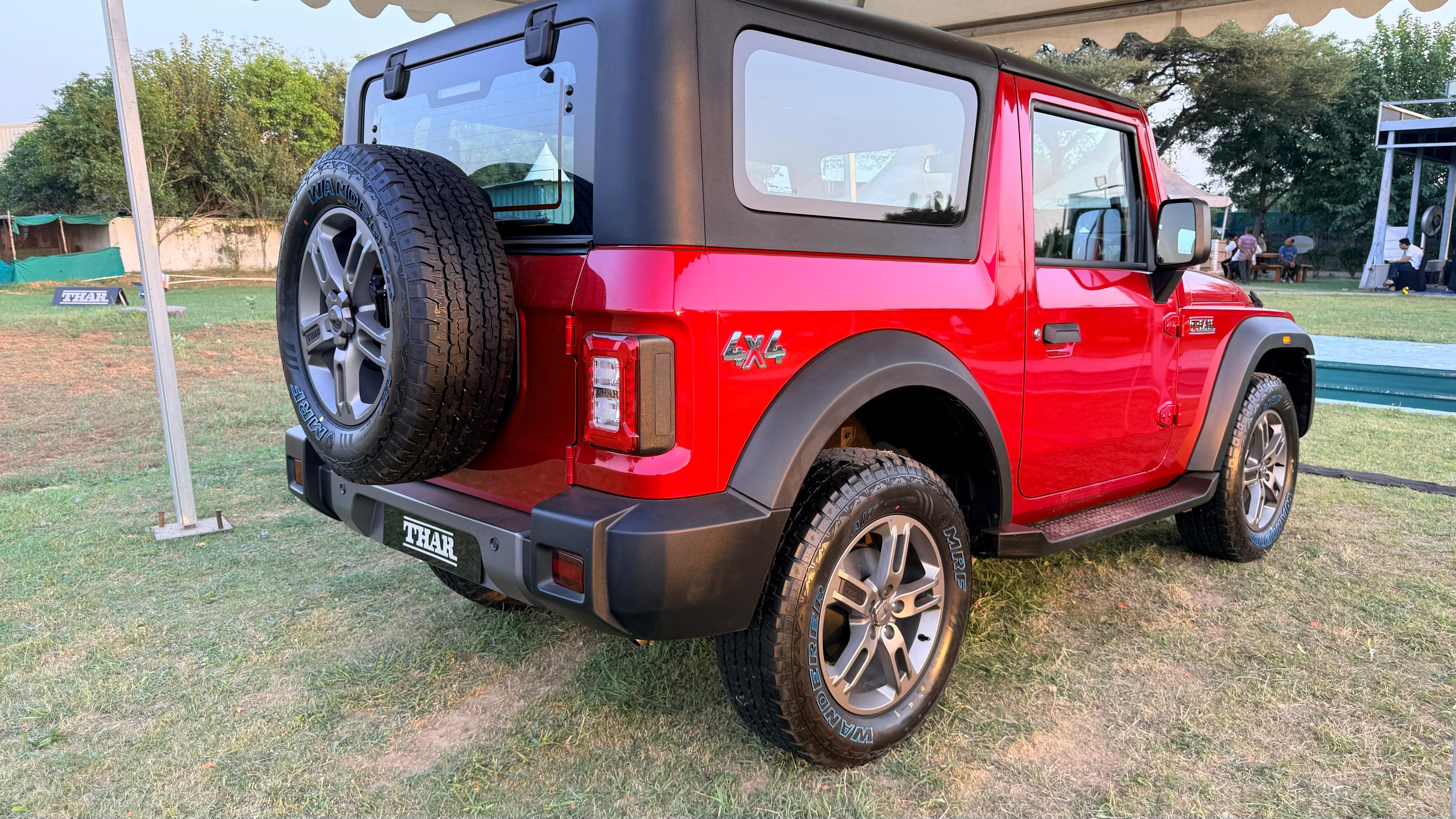 The front grille of the Mahindra Thar is now body-coloured instead of matte black, and the bumper wears a dual-tone finish Mahindra Thar facelift 2025