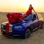 Nargis Fakhri posed to celebrate her new Rolls-Royce Cullinan.