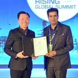  Mr. Pham Sanh Chau (left), CEO of Vingroup Asia and VinFast Asia, and Mr. Sanjay Kumar, IAS, Special Chief Secretary to the Government, Government of Telangana, at the signing ceremony.