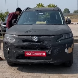 Camouflaged 2026 Maruti Brezza spotted on test with heavy wrap hiding changes.