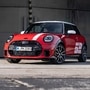 The Mini JCW 1965 Victory Edition in Chili Red, wearing the iconic “52” race number inspired by its 1965 rally triumph.