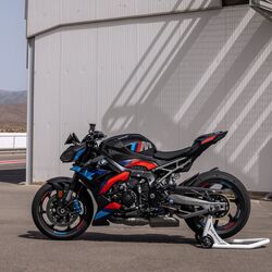 BMW M 1000 R roadster gets aerodynamic winglets and track-focused electronics.