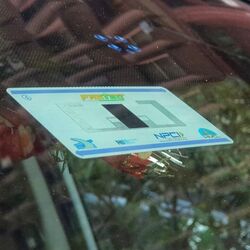 Vehicles fitted with FASTag move through a toll plaza as the annual pass fee rises to ₹3,075 from April 1, 2026.